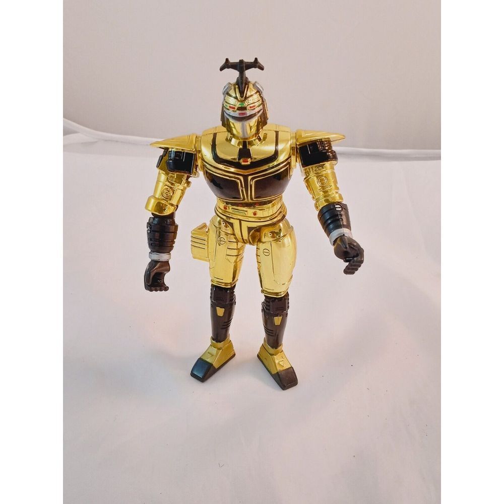Beetleborgs Beetle Blast'n Chromium Gold Beetleborg flip head action figure 1997